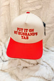 Put It On My Husband’s Tab Trucker Hat