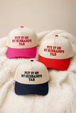Put It On My Husband’s Tab Trucker Hat