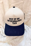 Put It On My Husband’s Tab Trucker Hat