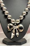 Bold Metallic Bow Statement Necklace – Gold & Silver