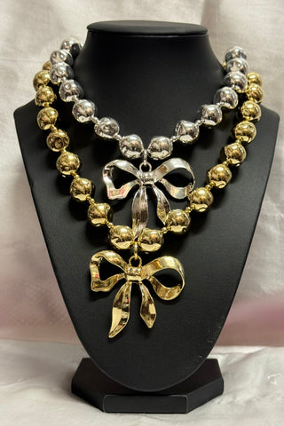 Bold Metallic Bow Statement Necklace – Gold & Silver
