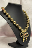 Bold Metallic Bow Statement Necklace – Gold & Silver